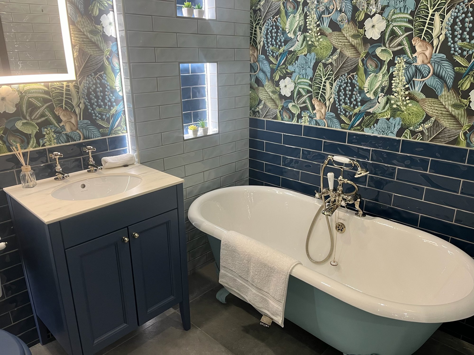 Navy Roll-Top Bathroom with Botanical Wallpaper — Oxfordshire